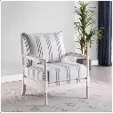 Silla decorativa tapizada con acento de husillo. Color blanco y azul marino