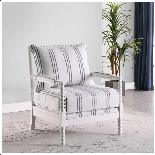 Silla decorativa tapizada con acento de husillo. Color blanco y azul marino