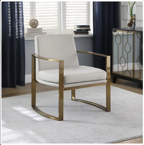 Silla decorativa con brazo cóncavo de metal, color crema y bronce